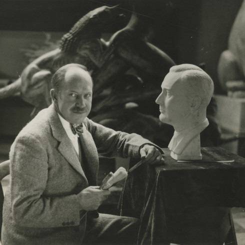 Sculptor Paul Manship with his bust of FDR in his Paris studio © 2021 James Abbe Archive